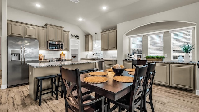 602 Franklin Ln, Lavon, TX 75166 - dining space with lofted ceiling, light wood-type flooring, and recessed lighting