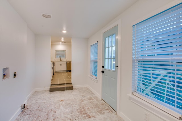 431 S Locust St, Mesquite, TX 75149 - doorway featuring recessed lighting and baseboards