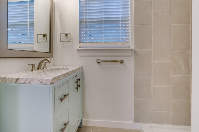 431 S Locust St, Mesquite, TX 75149 - full bathroom featuring vanity, a shower, tile patterned flooring, and plenty of natural light