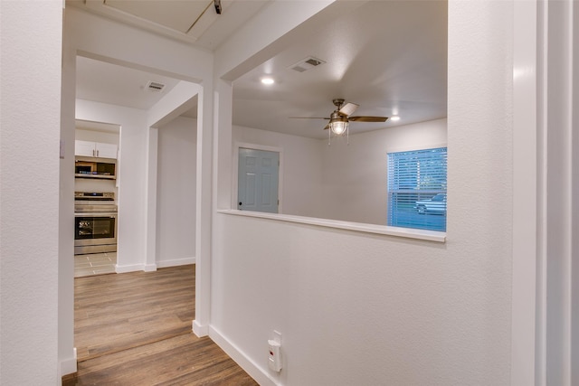 431 S Locust St, Mesquite, TX 75149 - corridor featuring wood finished floors and recessed lighting