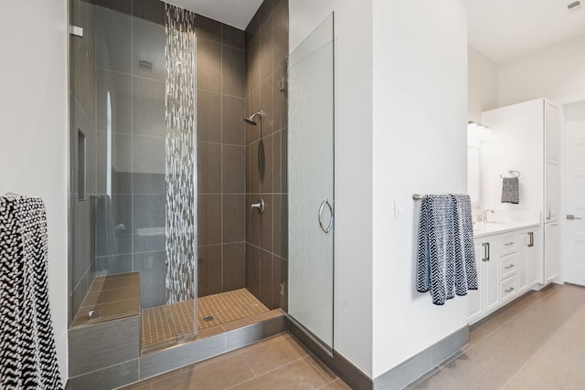 2800 Lakeside Pkwy Unit 1502, Flower Mound, TX 75022 - bathroom with tile patterned floors, a shower stall, and vanity