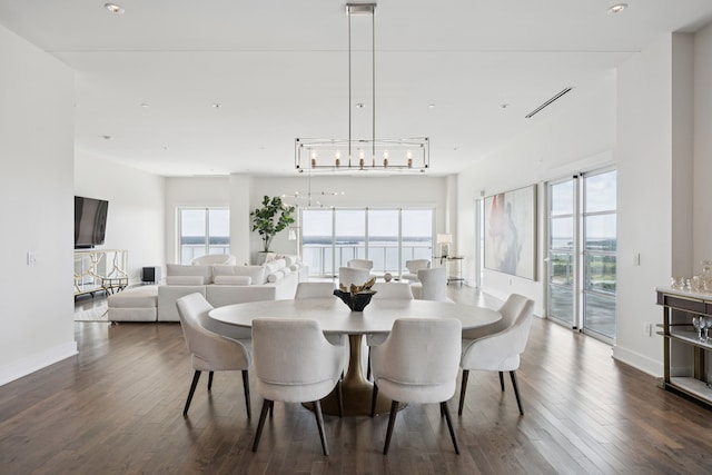 2800 Lakeside Pkwy Unit 1502, Flower Mound, TX 75022 - dining space with dark wood-type flooring, a chandelier, and recessed lighting