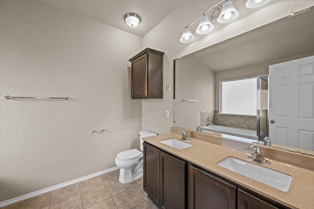 9444 Centennial Dr, Waco, TX 76708 - bathroom with a garden tub, double vanity, tile patterned flooring, and a shower