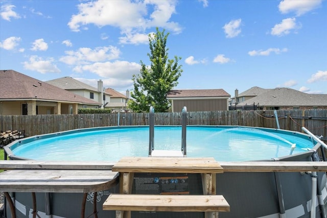 9444 Centennial Dr, Waco, TX 76708 - view of swimming pool with a residential view and a fenced backyard