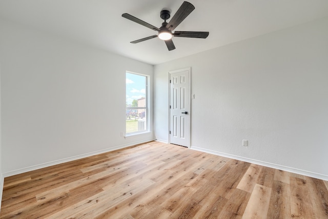 123 Rolling Spring Dr, Aledo, TX 76008 - empty room with light wood-style flooring and ceiling fan