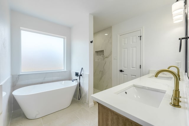 123 Rolling Spring Dr, Aledo, TX 76008 - full bathroom featuring double vanity, a soaking tub, and a walk in shower