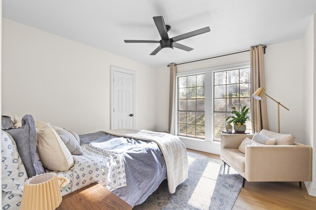 915 Slippery Elm Dr, Ovilla, TX 75154 - bedroom featuring wood finished floors and a ceiling fan