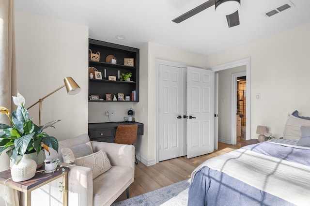 915 Slippery Elm Dr, Ovilla, TX 75154 - bedroom with light wood-type flooring, a ceiling fan, and a closet