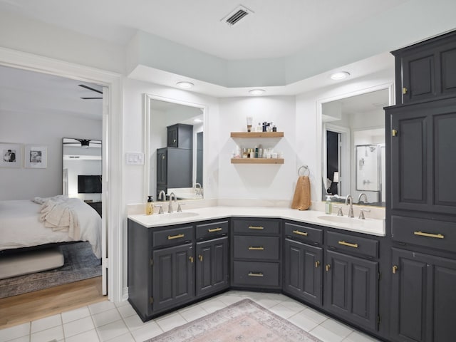 915 Slippery Elm Dr, Ovilla, TX 75154 - full bathroom featuring double vanity, ensuite bath, tile patterned flooring, ceiling fan, and recessed lighting