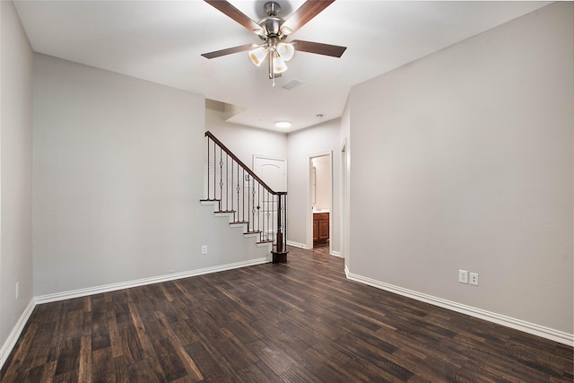 1511 Biltmore Ln, Irving, TX 75063 - spare room featuring dark wood-type flooring, stairs, and a ceiling fan