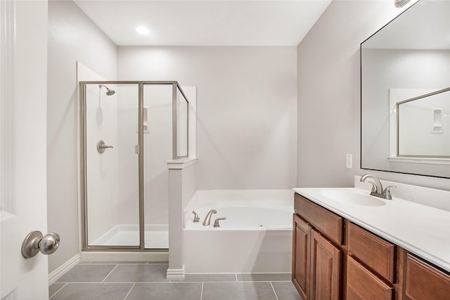 1511 Biltmore Ln, Irving, TX 75063 - bathroom with a stall shower, a bath, tile patterned flooring, and vanity