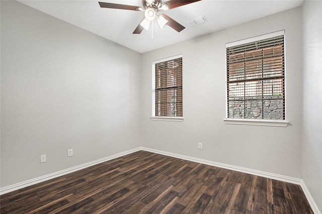 1511 Biltmore Ln, Irving, TX 75063 - unfurnished room with dark wood finished floors and a ceiling fan