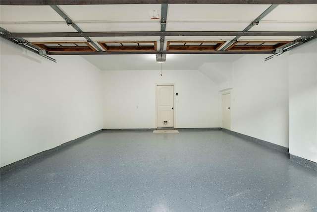 1511 Biltmore Ln, Irving, TX 75063 - garage featuring a garage door opener and baseboards