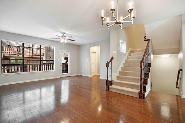 1511 Biltmore Ln, Irving, TX 75063 - unfurnished living room with ceiling fan, wood finished floors, stairway, and a chandelier