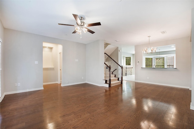 1511 Biltmore Ln, Irving, TX 75063 - unfurnished living room featuring stairs, a chandelier, a ceiling fan, and wood finished floors