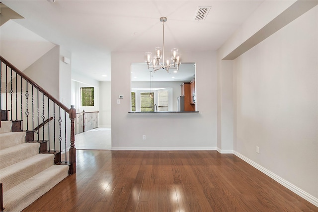 1511 Biltmore Ln, Irving, TX 75063 - entrance foyer with a chandelier, dark wood-style floors, stairs, and recessed lighting