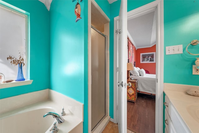 705 Tahoe Trail Dr, Hewitt, TX 76643 - ensuite bathroom featuring a stall shower, a garden tub, and vanity