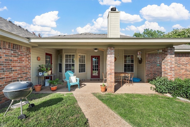705 Tahoe Trail Dr, Hewitt, TX 76643 - rear view of property featuring brick siding, a patio area, a chimney, and a lawn