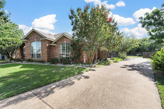 705 Tahoe Trail Dr, Hewitt, TX 76643 - view of front of home with brick siding and driveway