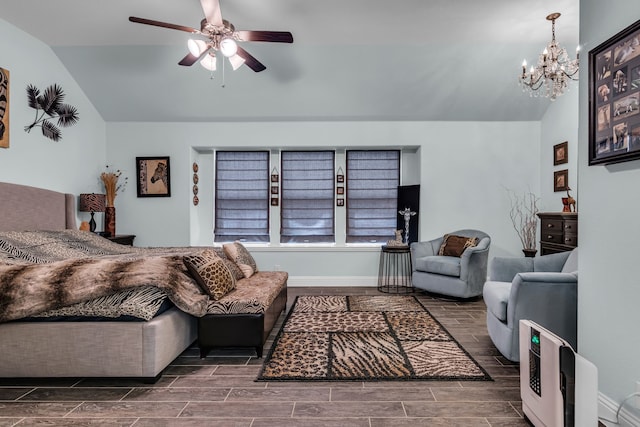 108 Gateway Dr, Alvarado, TX 76009 - living room featuring vaulted ceiling, wood finish floors, ceiling fan, and a chandelier