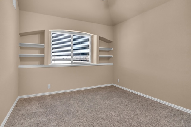 108 Gateway Dr, Alvarado, TX 76009 - carpeted empty room featuring baseboards and lofted ceiling
