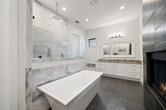 4441 Amherst Ave, University Park, TX 75225 - full bathroom featuring a soaking tub, a tile shower, vanity, and recessed lighting