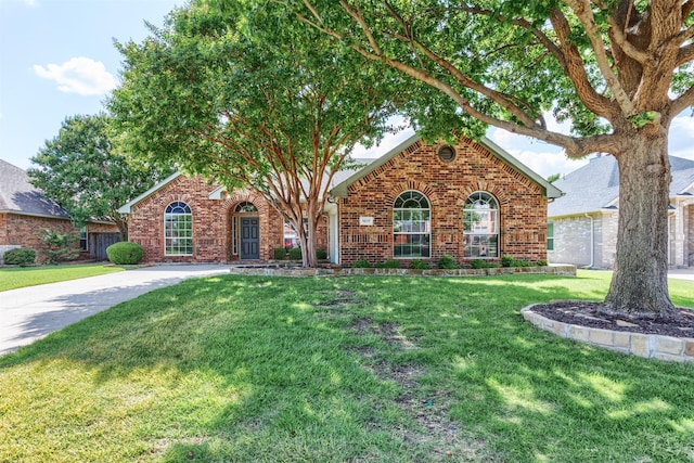 1017 Nickerson Ln, Plano, TX 75094 - view of front of house featuring brick siding and a front yard