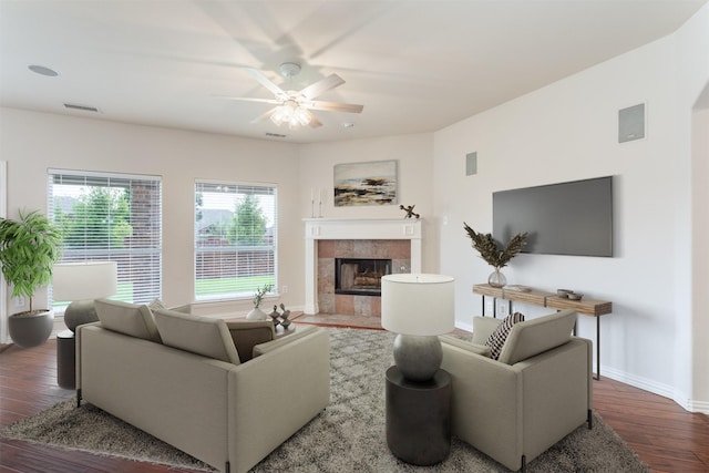 1017 Nickerson Ln, Plano, TX 75094 - living room featuring a tile fireplace, wood finished floors, and a ceiling fan
