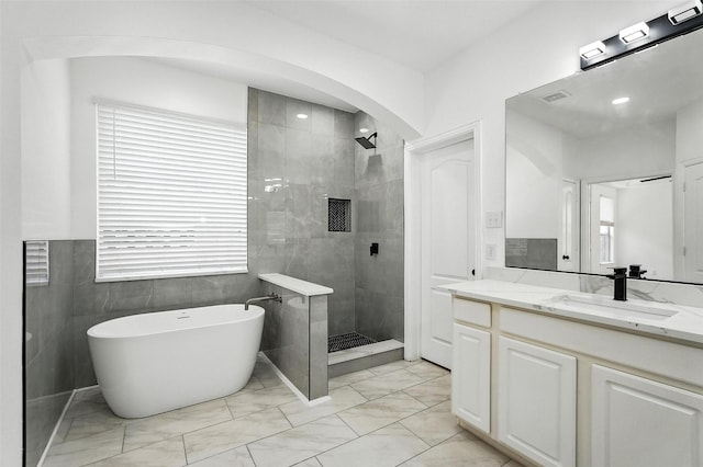 1720 Harvest Glen Dr, Allen, TX 75002 - full bathroom with a stall shower, vanity, marble finish flooring, and a freestanding bath