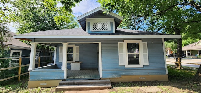940 W 7th St, Dallas, TX 75208 - bungalow-style house with crawl space, covered porch, and a shingled roof