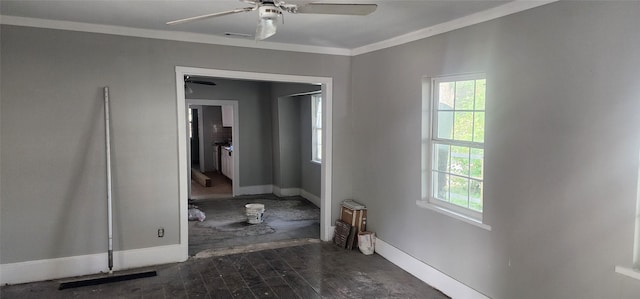 940 W 7th St, Dallas, TX 75208 - empty room featuring plenty of natural light, ceiling fan, dark wood finished floors, and ornamental molding