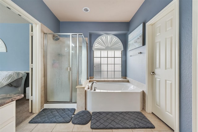 461 Running Water Trl, Fort Worth, TX 76131 - full bathroom featuring tile patterned flooring, a shower stall, a bath, and vanity
