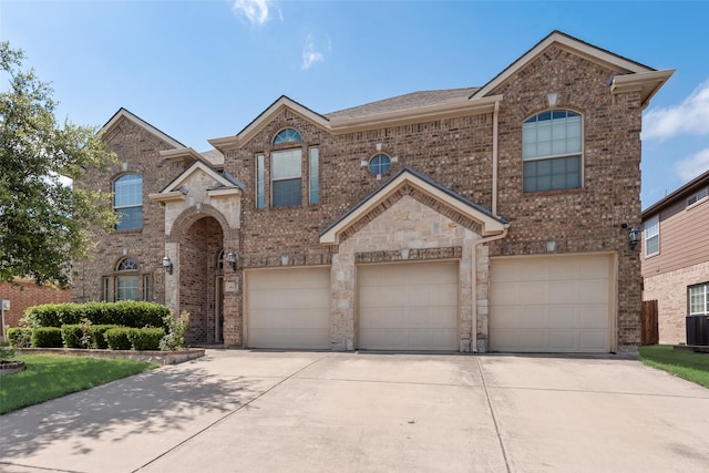 461 Running Water Trl, Fort Worth, TX 76131 - view of front of home with driveway, an attached garage, and brick siding