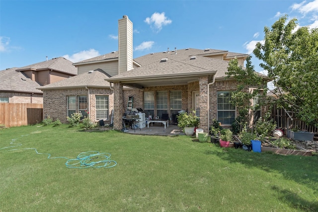 461 Running Water Trl, Fort Worth, TX 76131 - back of property with a patio, brick siding, roof with shingles, and a chimney