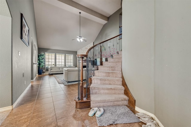 461 Running Water Trl, Fort Worth, TX 76131 - stairs featuring ceiling fan, tile patterned flooring, beam ceiling, and high vaulted ceiling