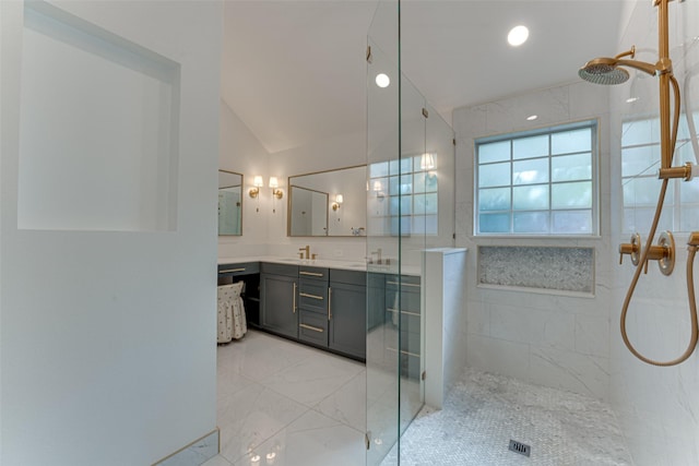 4508 Crystal Mountain Dr, Richardson, TX 75082 - bathroom featuring a tile shower, vanity, vaulted ceiling, and marble finish flooring