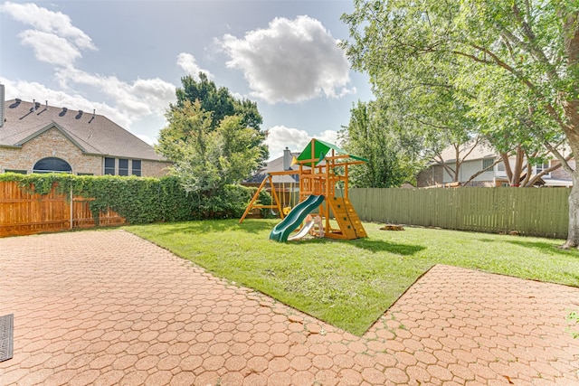 4508 Crystal Mountain Dr, Richardson, TX 75082 - fenced backyard featuring a playground and a patio area