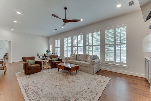 4508 Crystal Mountain Dr, Richardson, TX 75082 - living room with plenty of natural light, ceiling fan, wood finished floors, and recessed lighting