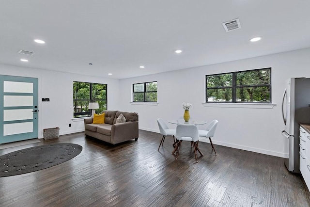 1104 Holiday Dr, Tool, TX 75143 - living room with dark wood-type flooring and recessed lighting