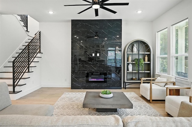 1338 E Kiest Blvd, Dallas, TX 75216 - living area featuring a ceiling fan, wood finished floors, stairway, and recessed lighting