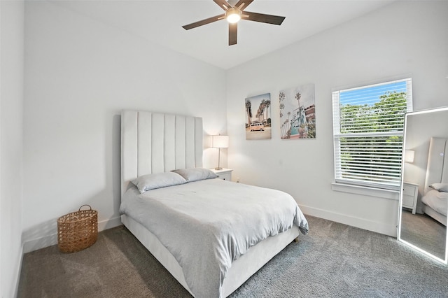 1338 E Kiest Blvd, Dallas, TX 75216 - carpeted bedroom with baseboards and a ceiling fan