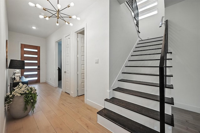 1338 E Kiest Blvd, Dallas, TX 75216 - entrance foyer featuring a chandelier, stairway, light wood-type flooring, and recessed lighting