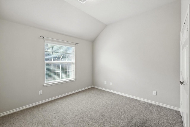 11412 Grapeleaf Dr, Fort Worth, TX 76244 - spare room featuring carpet flooring and vaulted ceiling