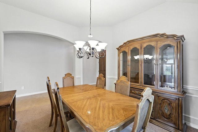 11412 Grapeleaf Dr, Fort Worth, TX 76244 - carpeted dining room with a chandelier and arched walkways
