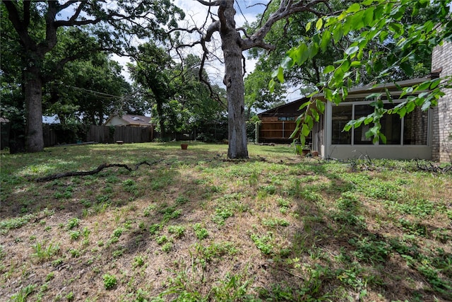 5705 Kingstree Ct, Arlington, TX 76017 - view of yard with a sunroom