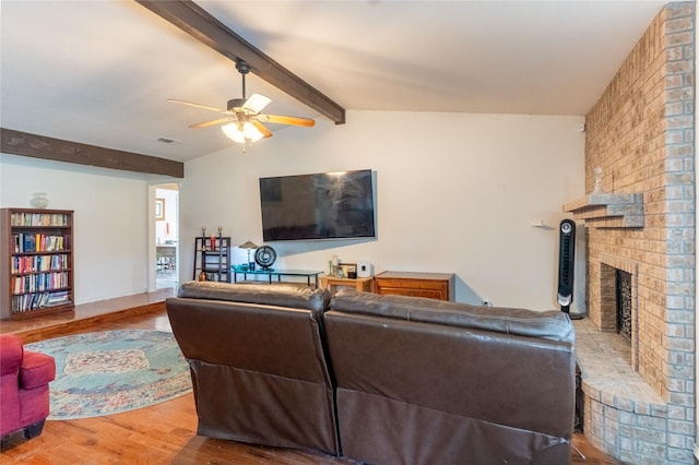 5705 Kingstree Ct, Arlington, TX 76017 - living area with a brick fireplace, wood finished floors, and a ceiling fan