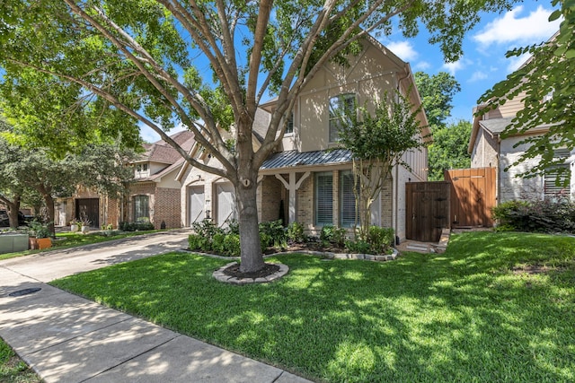 2248 Forest Hollow Park, Dallas, TX 75228 - traditional-style home featuring brick siding, a gate, concrete driveway, a standing seam roof, and a metal roof