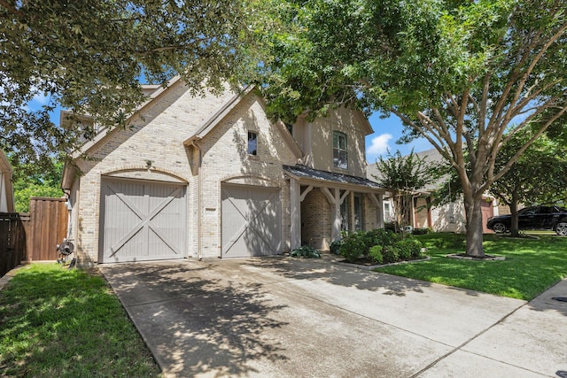 2248 Forest Hollow Park, Dallas, TX 75228 - view of front of house featuring brick siding, concrete driveway, and a standing seam roof