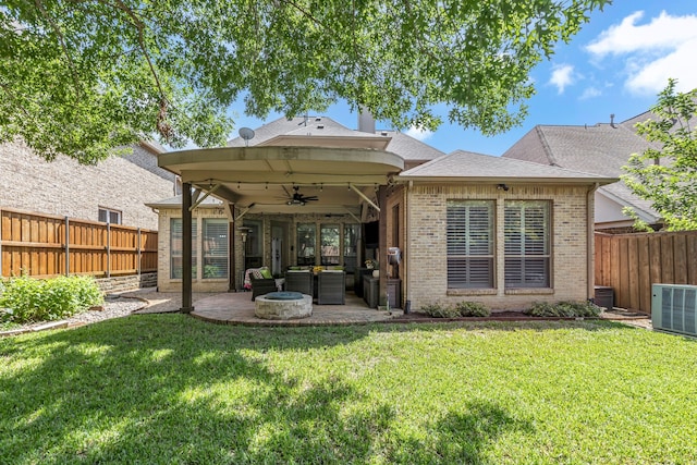 2248 Forest Hollow Park, Dallas, TX 75228 - rear view of property featuring an outdoor hangout area, a ceiling fan, brick siding, a fenced backyard, and a patio area