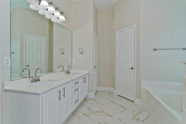 2505 Hunters Run Dr, Plano, TX 75025 - bathroom with marble look tile flooring, double vanity, and a garden tub